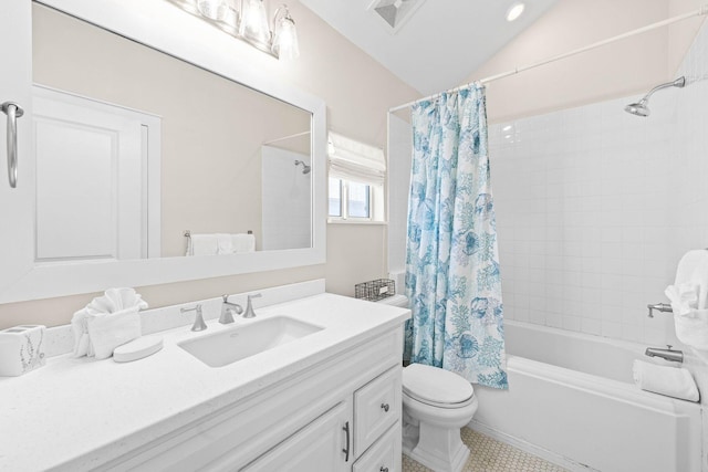 full bathroom featuring vanity, lofted ceiling, tile patterned floors, toilet, and shower / tub combo