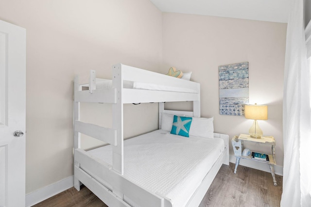 bedroom with wood-type flooring