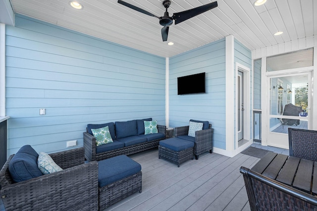 wooden terrace featuring an outdoor hangout area