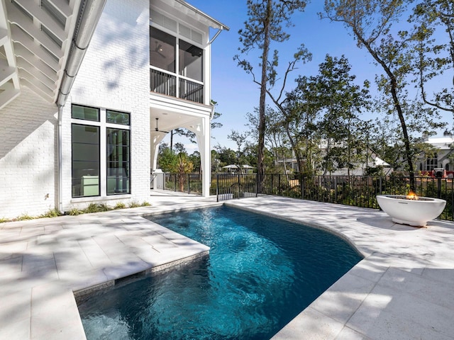 view of pool featuring a patio area