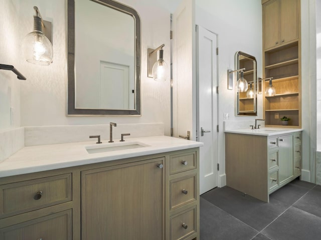 bathroom with tile patterned flooring and vanity