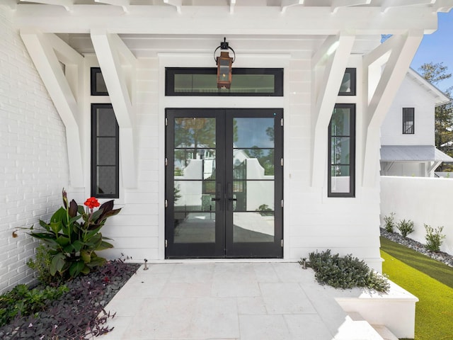 doorway to property with french doors