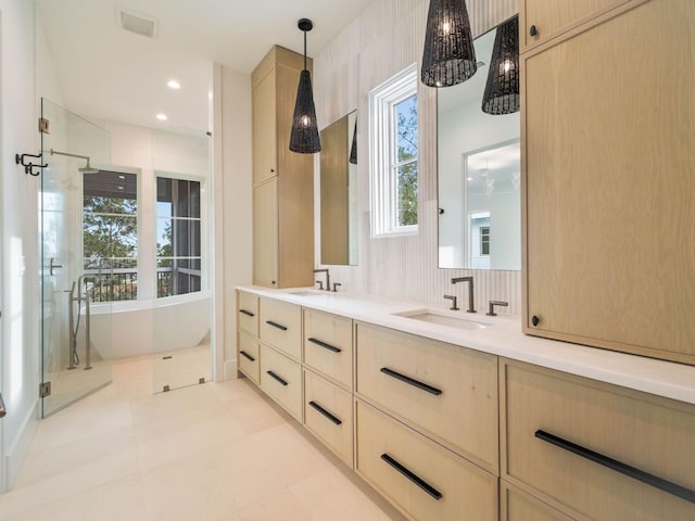 bathroom with tile patterned floors, vanity, independent shower and bath, and tasteful backsplash