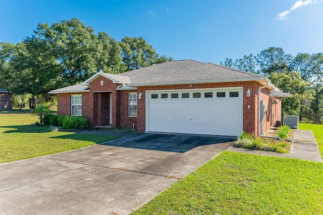 ranch-style house featuring a garage and a front lawn