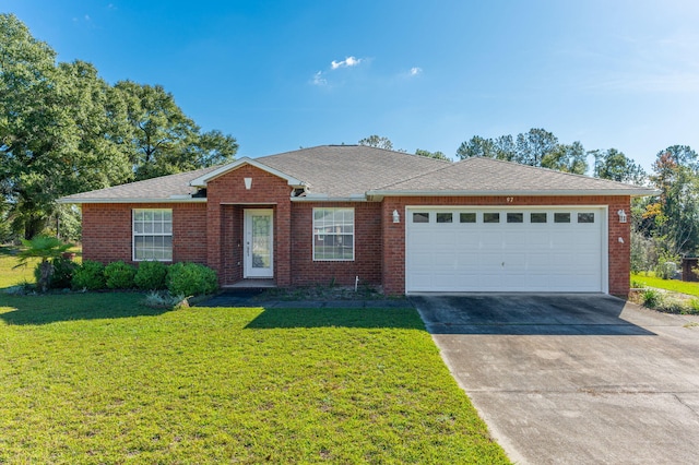 ranch-style house with a front yard and a garage