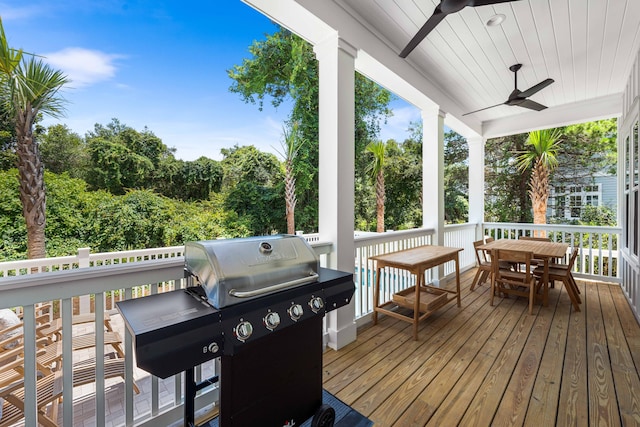 deck featuring grilling area and ceiling fan