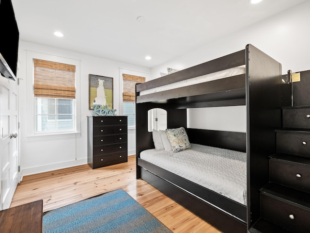 bedroom featuring recessed lighting, baseboards, and wood finished floors