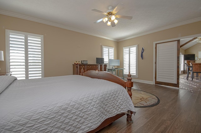 bedroom with dark hardwood / wood-style flooring, ornamental molding, a textured ceiling, ceiling fan, and lofted ceiling