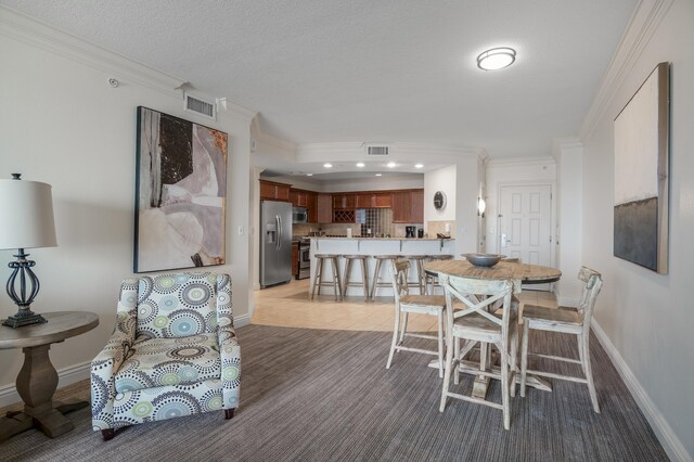 10 Harbor Blvd Unit W528, Destin, FL 32541 - dining room with crown molding and recessed lighting