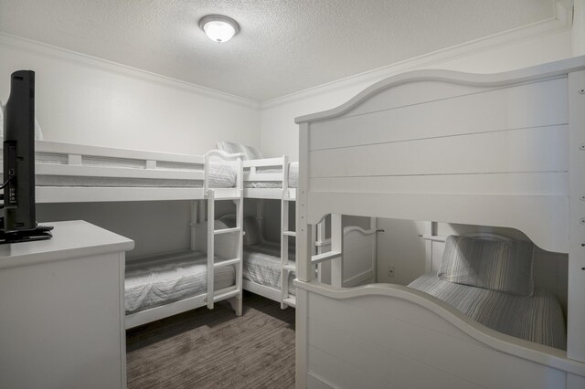10 Harbor Blvd Unit W528, Destin, FL 32541 - bedroom with ornamental molding and a textured ceiling