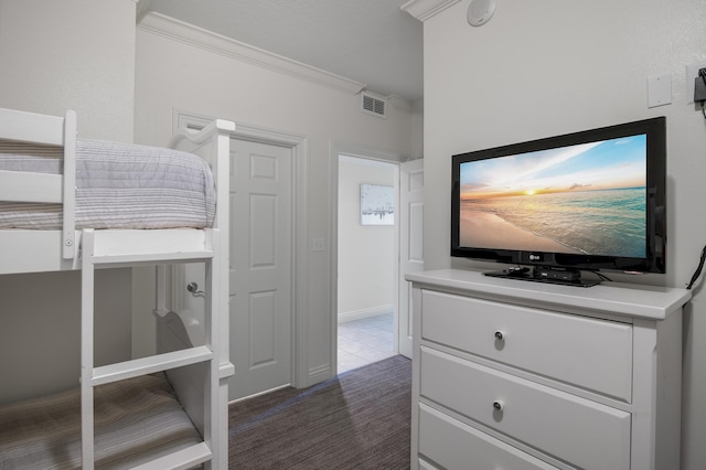 10 Harbor Blvd Unit W528, Destin, FL 32541 - bedroom featuring ornamental molding and dark colored carpet