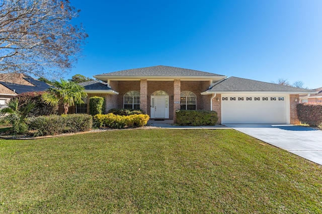 view of front facade featuring a front lawn and a garage