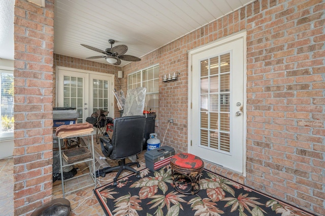 view of patio featuring ceiling fan and french doors