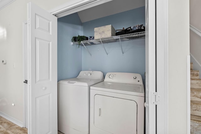 laundry room featuring washing machine and dryer