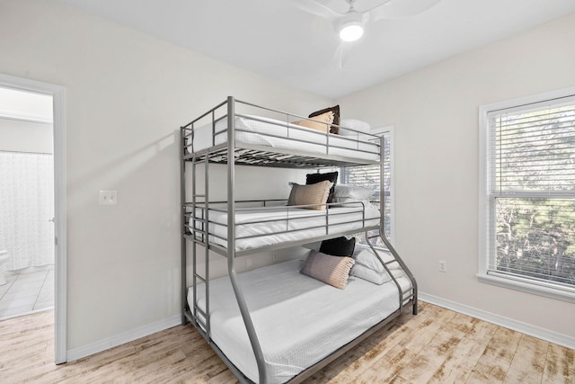 bedroom featuring ceiling fan and light hardwood / wood-style flooring