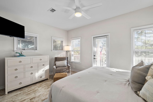 bedroom featuring ceiling fan and light hardwood / wood-style flooring