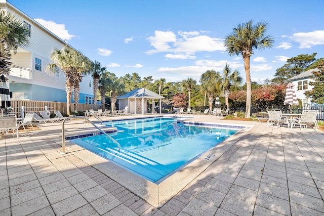 view of swimming pool featuring a patio area