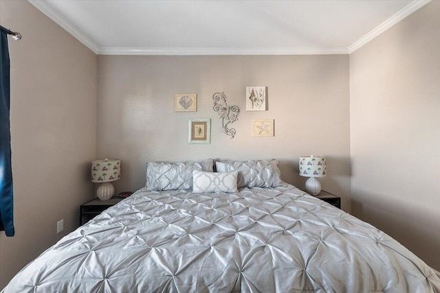 bedroom featuring crown molding