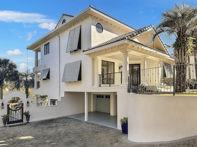 view of front of property with a garage