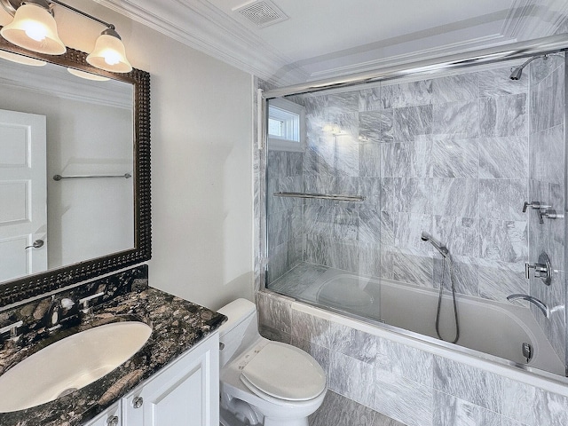 full bathroom with toilet, ornamental molding, shower / bath combination with glass door, and vanity