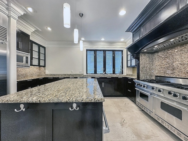 kitchen featuring appliances with stainless steel finishes, decorative light fixtures, ornamental molding, a center island, and custom range hood