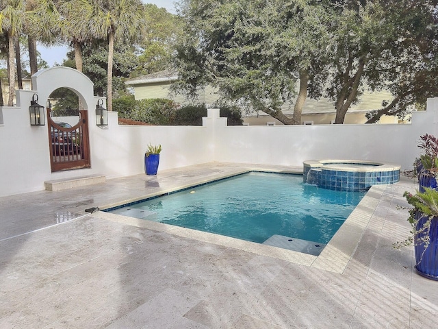 view of pool featuring a patio, central air condition unit, and an in ground hot tub