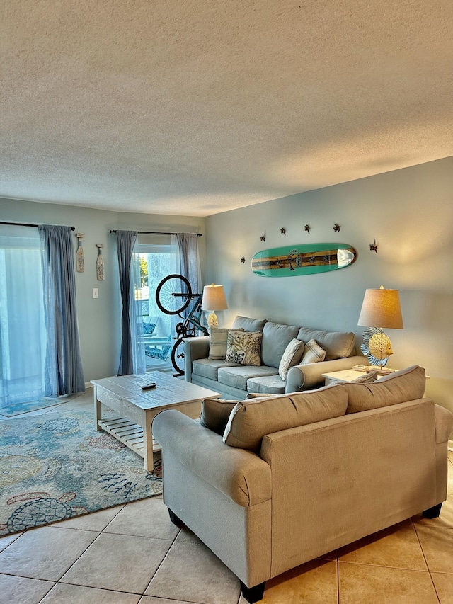 tiled living room with a textured ceiling