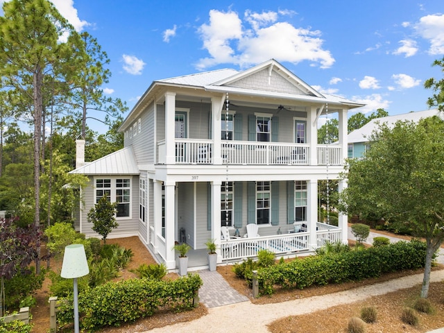 view of front facade with a porch and a balcony