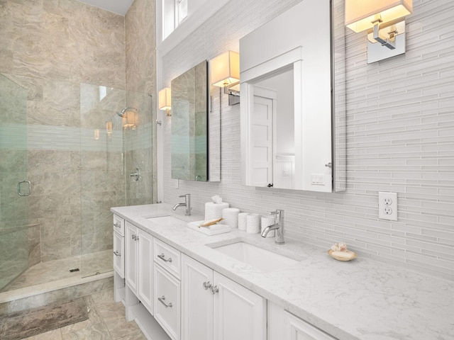 bathroom with backsplash, vanity, tile walls, and walk in shower