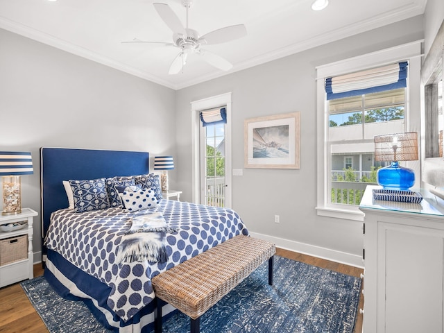 bedroom with ceiling fan, hardwood / wood-style floors, and crown molding