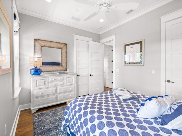 bedroom featuring ceiling fan, crown molding, and dark wood-type flooring