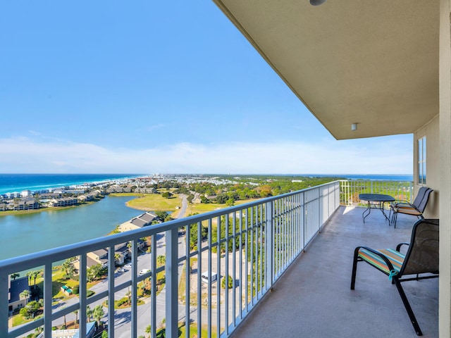 balcony featuring a water view