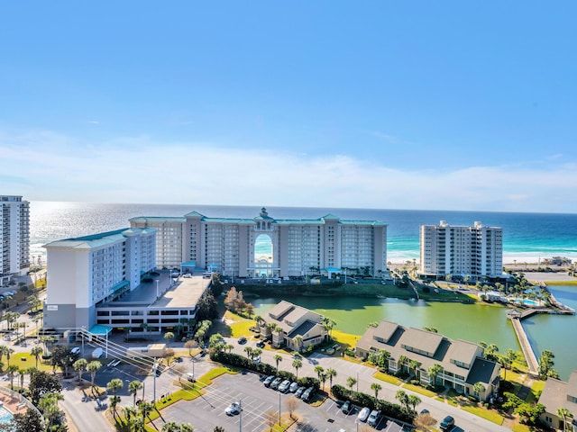 birds eye view of property with a water view