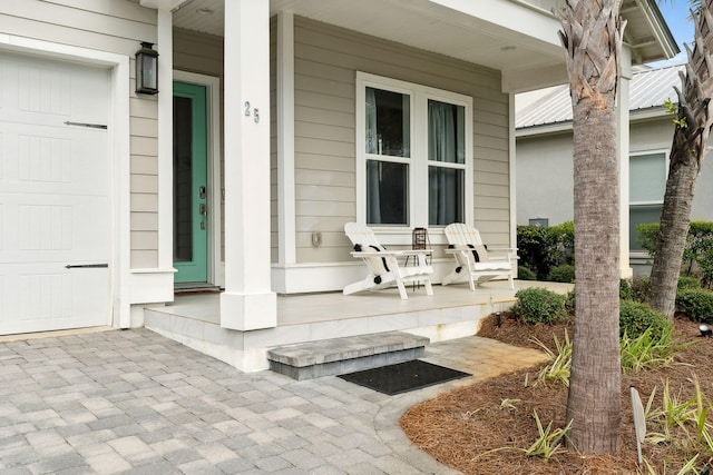 entrance to property with a porch