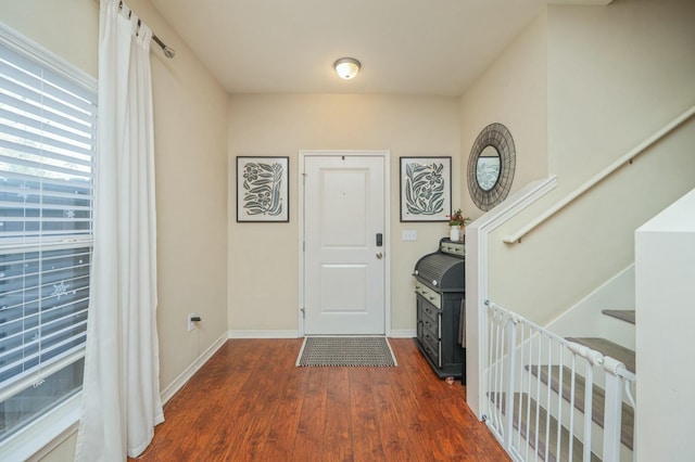 foyer featuring dark hardwood / wood-style flooring