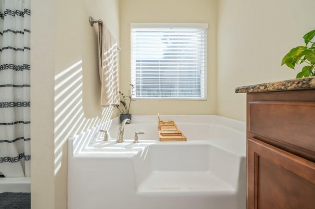 bathroom with separate shower and tub