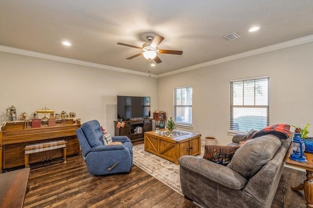 living room with ceiling fan, dark wood-type flooring, and ornamental molding