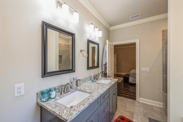 bathroom featuring vanity and ornamental molding