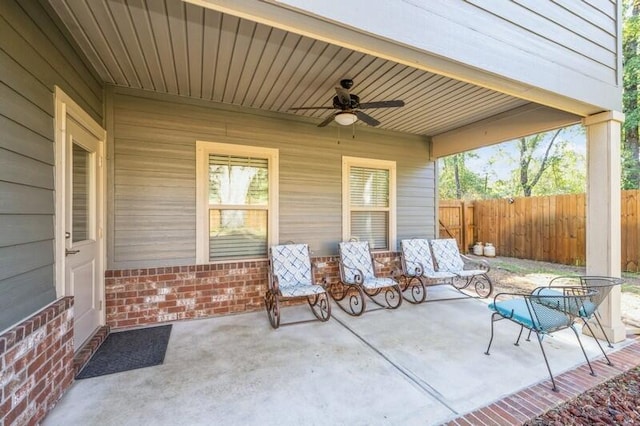 view of patio featuring ceiling fan