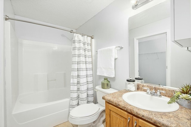 full bathroom with shower / bath combo, toilet, a textured ceiling, and vanity