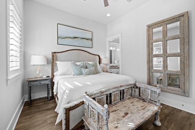 bedroom featuring ceiling fan and dark hardwood / wood-style flooring