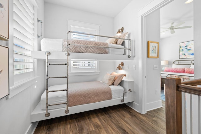 bedroom featuring ceiling fan and dark hardwood / wood-style flooring