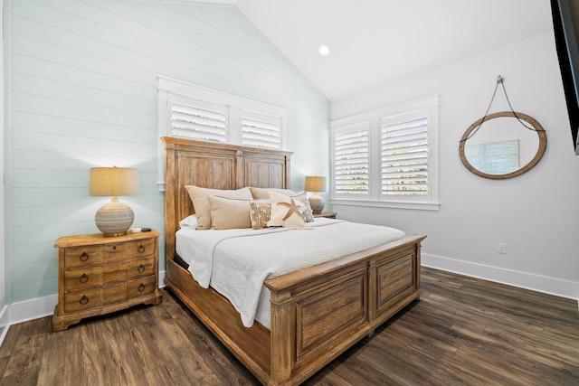 bedroom featuring lofted ceiling and dark wood-type flooring