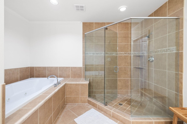 bathroom with tile patterned floors, crown molding, and plus walk in shower