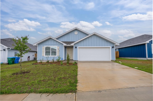 view of front of house with a front lawn and a garage