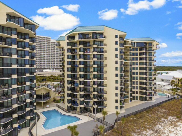 9850 S Thomas Dr Unit 1004W, Panama City Beach, FL 32408 - view of apartment building / complex with a community pool