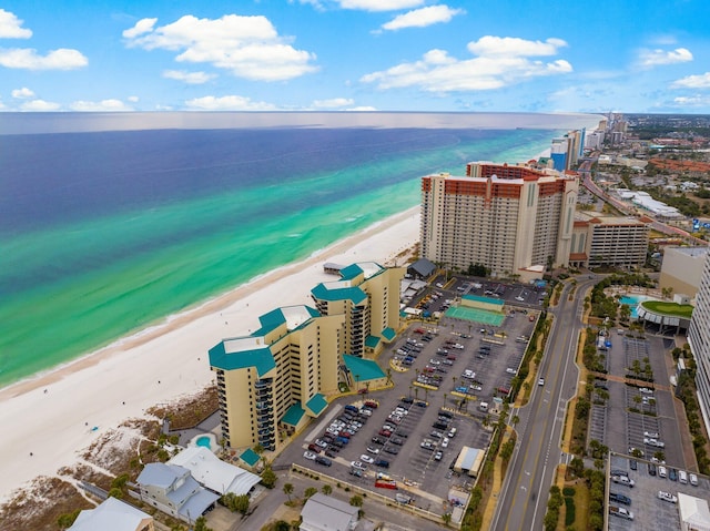 aerial view featuring a water view and a beach view