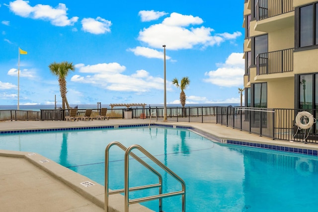 view of swimming pool featuring a patio