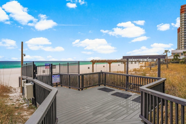 9850 S Thomas Dr Unit 1004W, Panama City Beach, FL 32408 - wooden terrace with view of water and beach