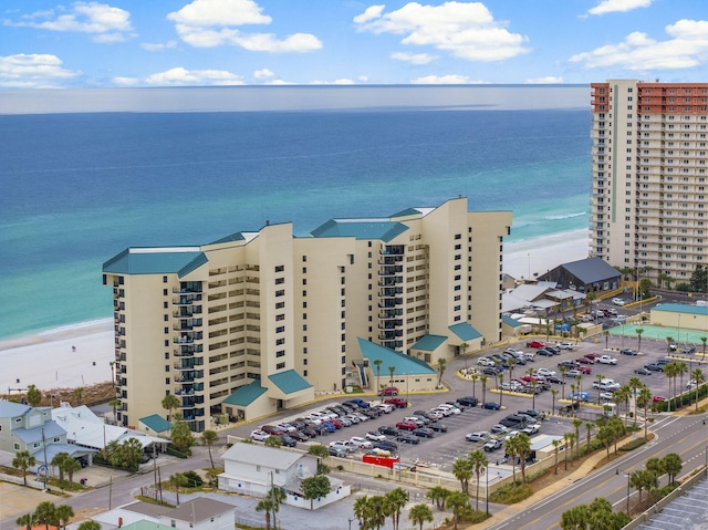 bird's eye view with a water view and a view of the beach